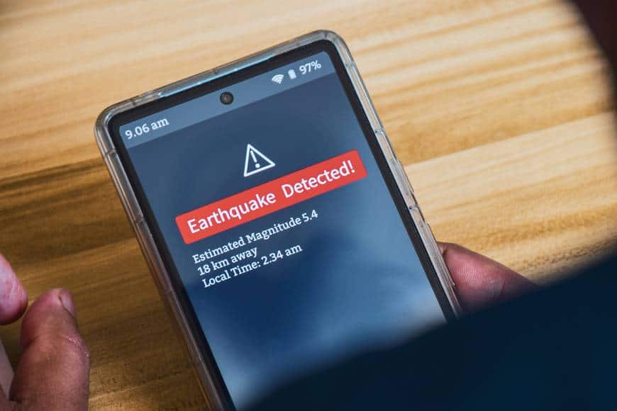 smartphone showing earthquake warning